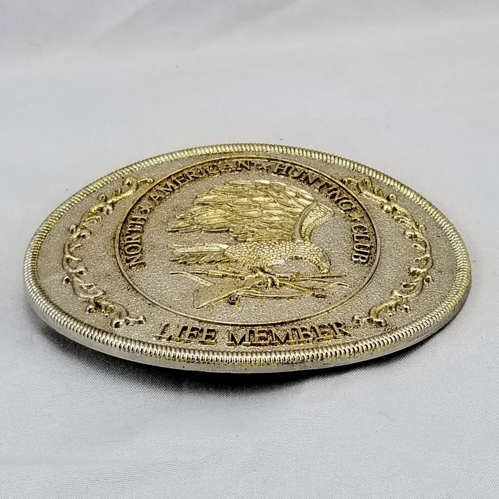 North American Hunting Club Belt Buckle – Eagle with Rifle & Shotgun Life Member